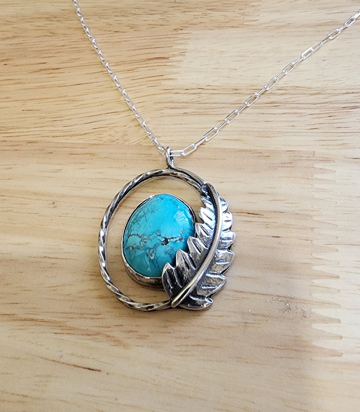 Turquoise feather pendant