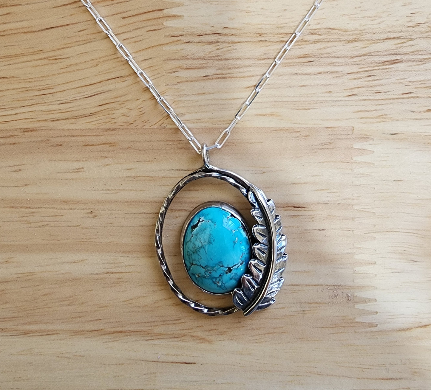 Turquoise feather pendant