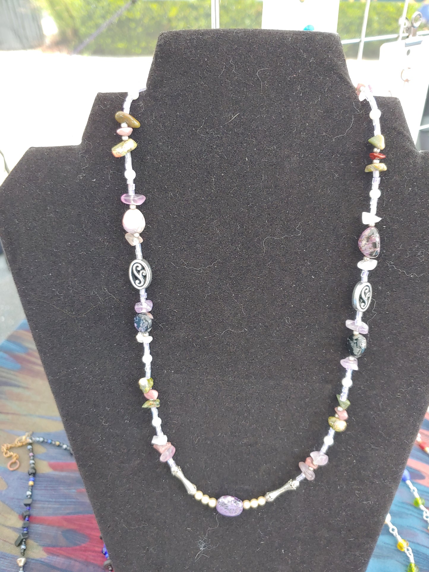 Single strand beaded necklace