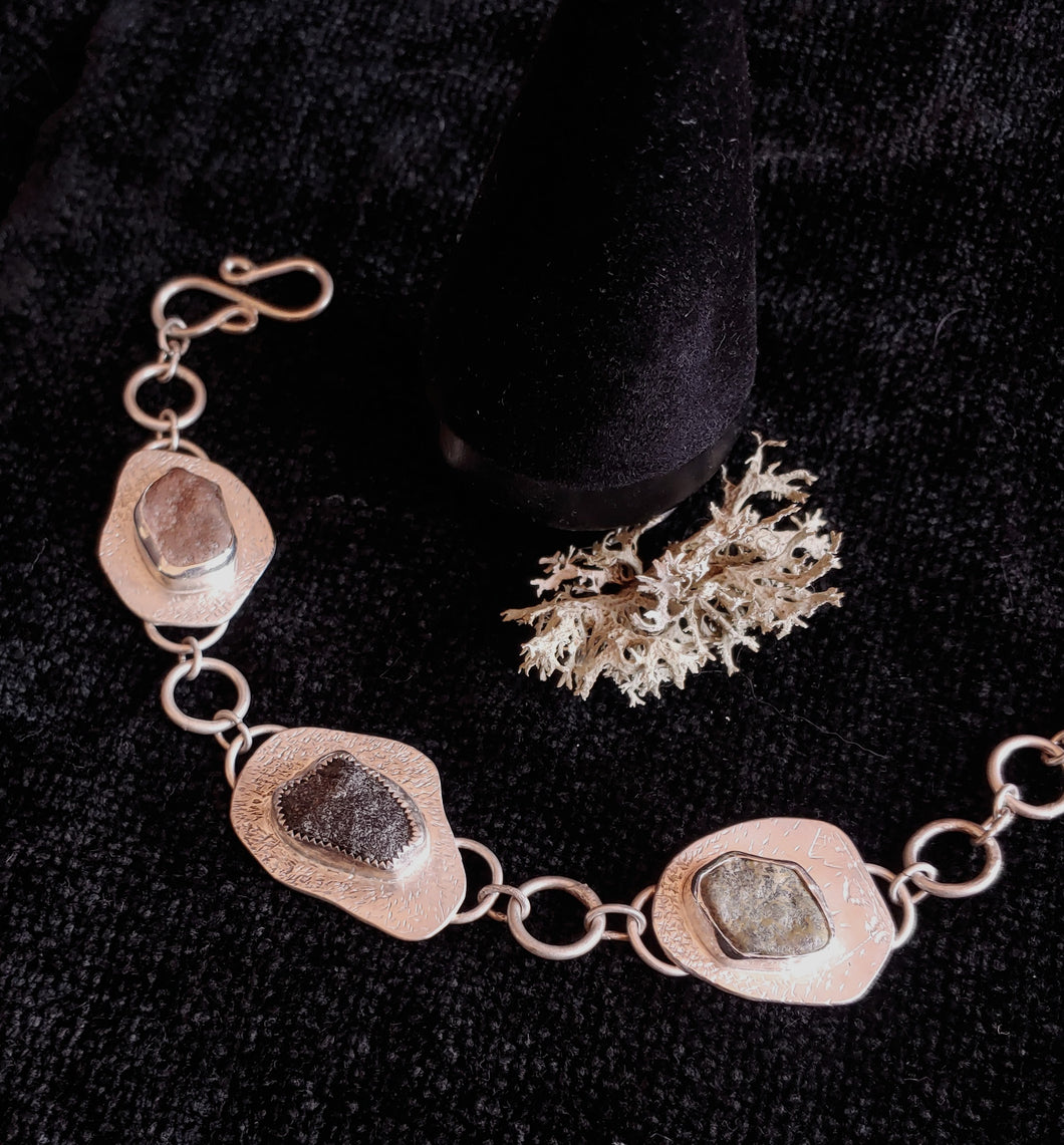 Three stone bracelet.