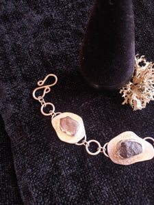 Three stone bracelet.