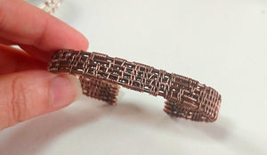 Woven copper cuff bracelet - "Keep Going"